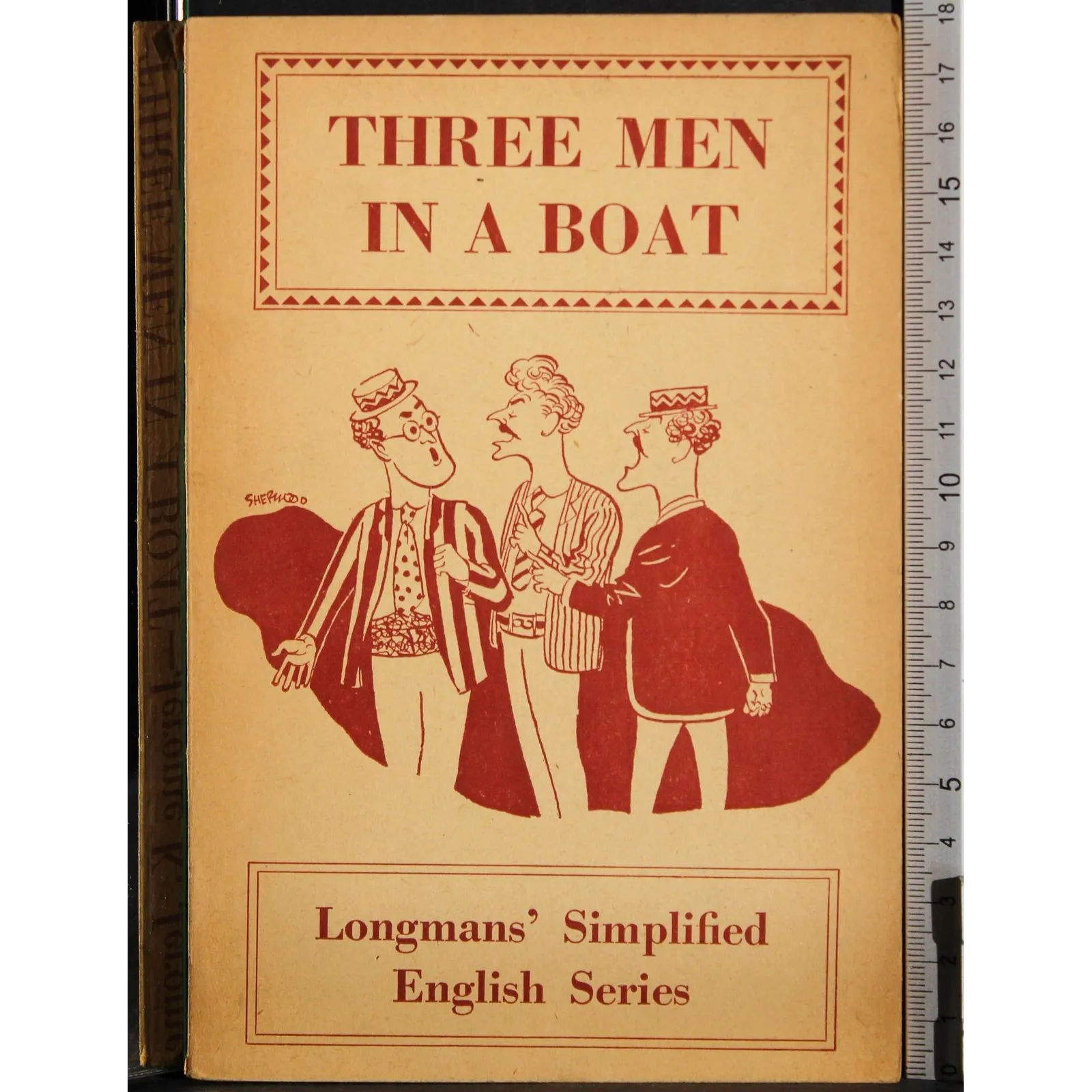 three men in a boat