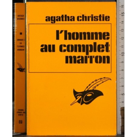 L'homme au complet marron