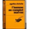 L'homme au complet marron