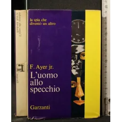 L'UOMO ALLO SPECCHIO
