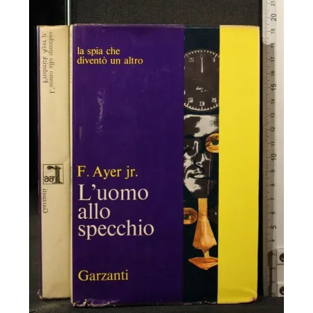 L'UOMO ALLO SPECCHIO