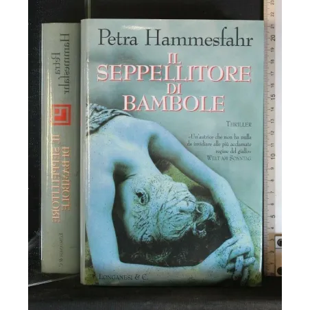 IL SEPPELLITORE DI BAMBOLE